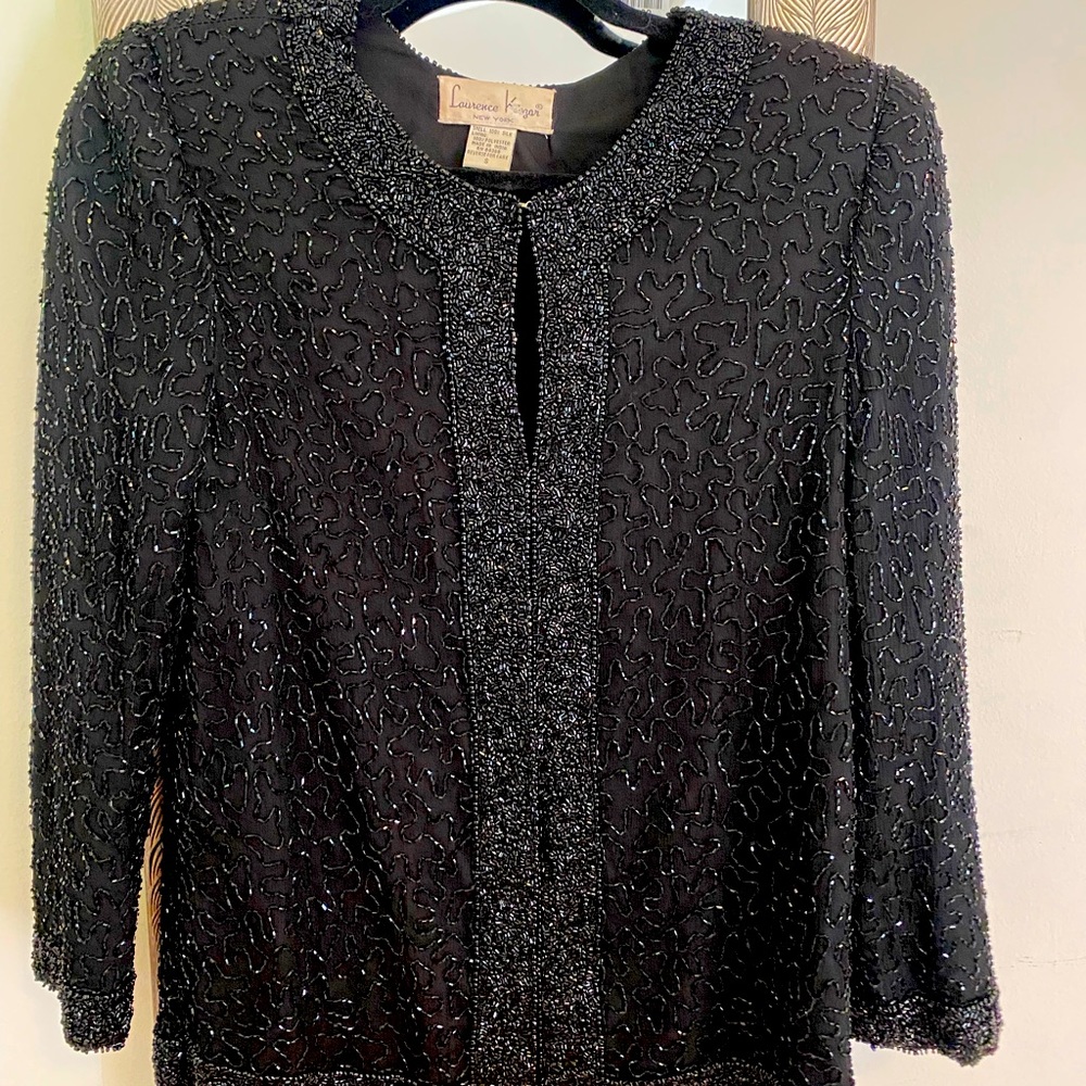 Beautiful vintage beads jacket with shoulder pads (can remove) very flattering.